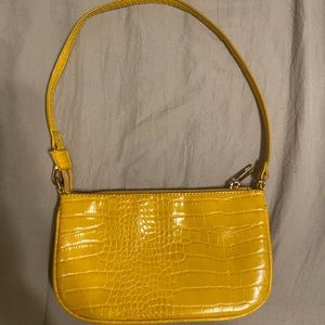 Yellow crocodile print purse